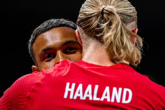 Erling Braut Haaland of Norway celebrates with teammate
