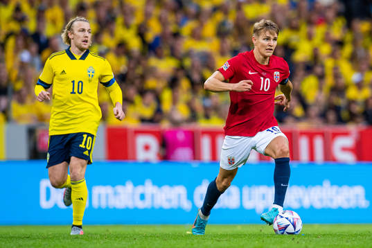 Emil Forsberg of Sweden and Martin Ødegaard of Norway