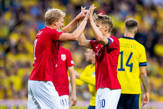 Morten Thorsby and Martin Ødegaard celebrate