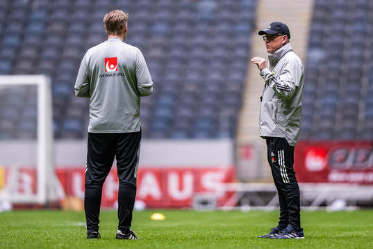 assistant coach Peter Wettergren and head coach Janne