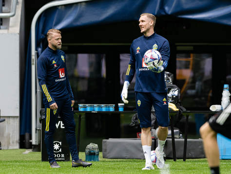 Daniel Sundgren and goalkeeper Robin Olsen of the Swedish