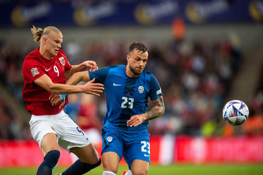 Erling Braut Haaland of Norway and David Brekalo of Slovenia