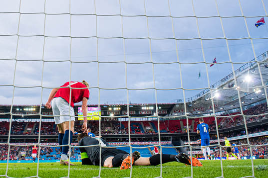 Erling Braut Haaland of Norway and Jan Oblak of Slovenia