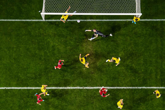 Nikola Milenkovic of Serbia scores 0-1 behind goalkeeper