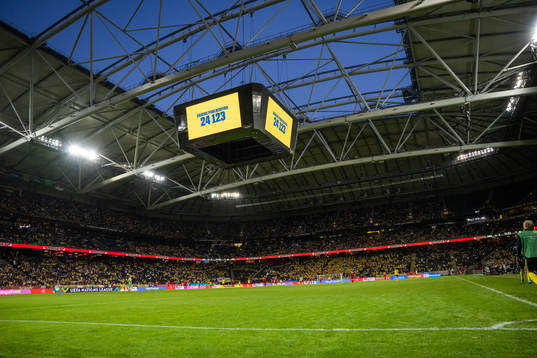 The Jumbotron shows the attendance