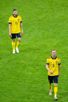 Edvin Kurtulus and Joel Andersson of Sweden look dejected