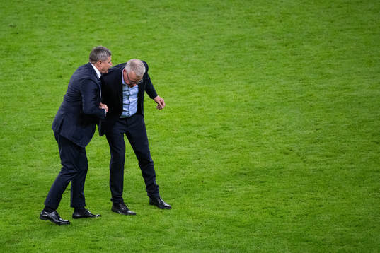 Head coach Dragan Stojkovic of Serbia and head coach Janne