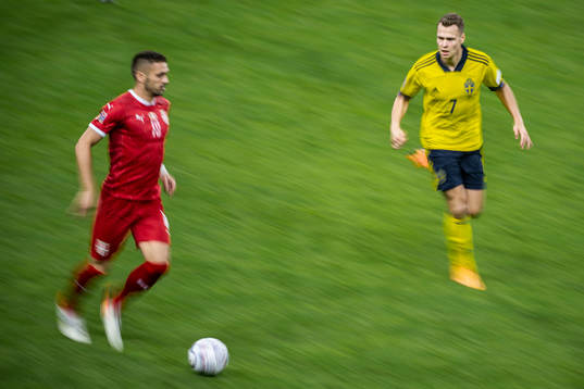 Dusan Tadic of Serbia and Viktor Claesson of Sweden