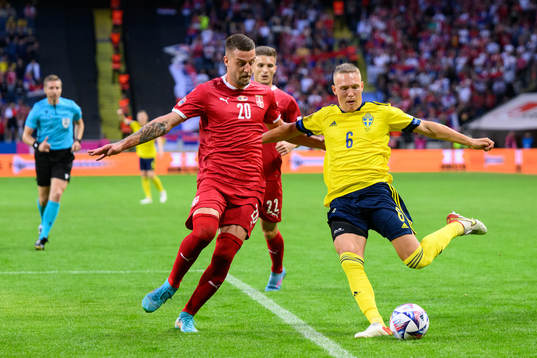 Sergej Milinkovic-Savic of Serbia and Ludwig Augustinsson
