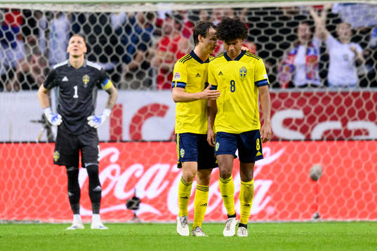 Hjalmar Ekdal and Jens Cajuste of Sweden look dejected