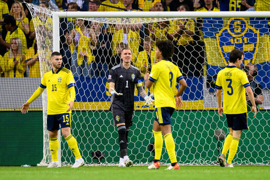 Edvin Kurtulus and goalkeeper Robin Olsen of Sweden look