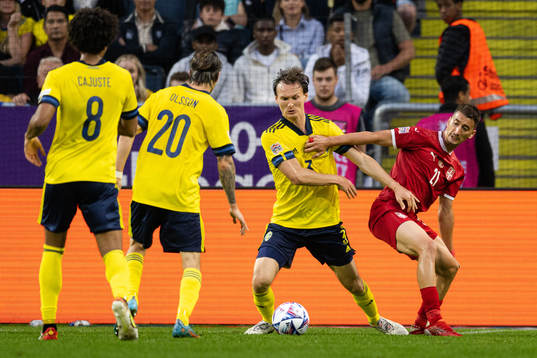 Hjalmar Ekdal of Sweden against Nemanja Gudelj of Serbia