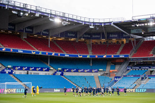 Players of the Swedish national football team warming up
