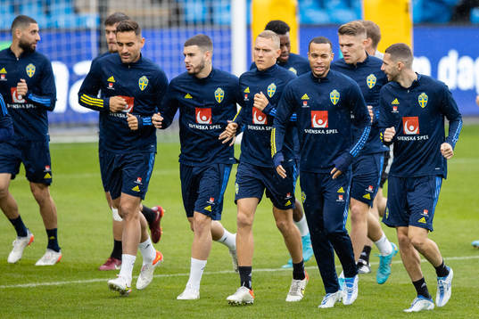 Ludwig Augustinsson and Robin Quaison of the Swedish
