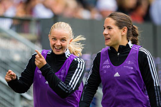 Synne Amdahl Brønstad and Marita Olsen of Rosenborg warms