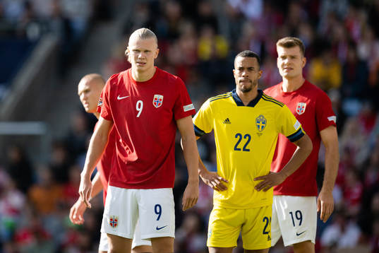 Erling Braut Haaland of Norway and Robin Quaison of Sweden