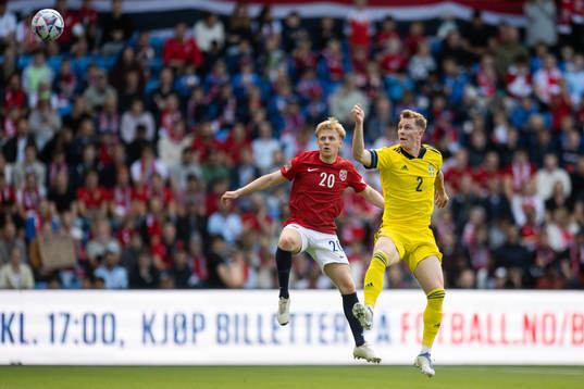 Mats Møller Dæhli of Norway and Emil Krafth of Sweden