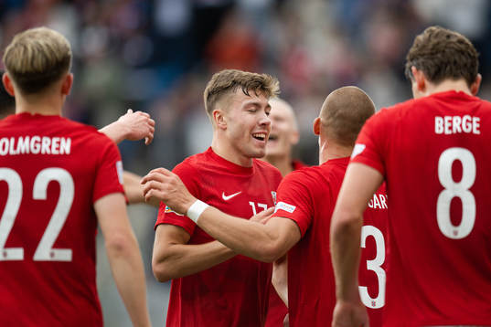 Fredrik Bjørkan of Norway celebrate