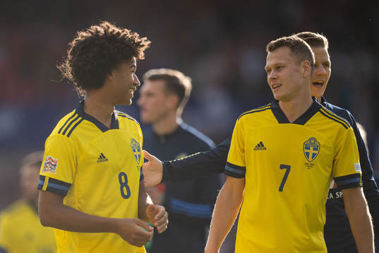 Jens Cajuste and Viktor Claesson of Sweden look dejected
