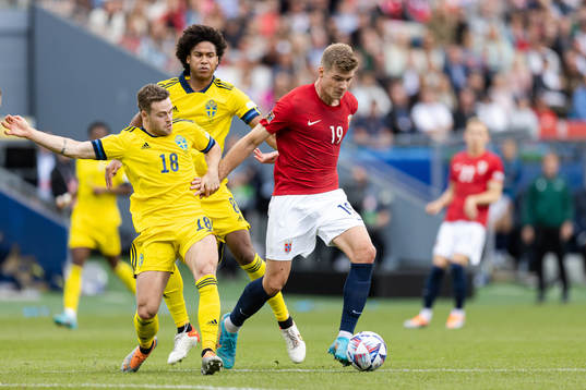 Gabriel Gudmundsson and Jens Cajuste of Sweden against
