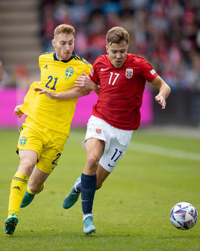 Dejan Kulusevski of Sweden and Fredrik Bjørkan of Norway
