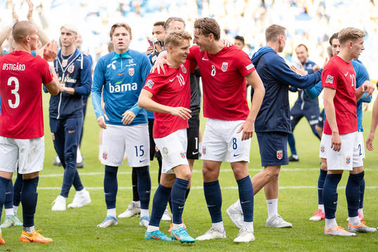 Martin Ødegaard and Sander Berge of Norway celebrates