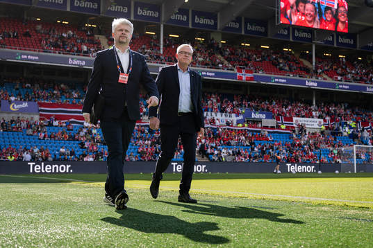 Temporary media officer Niclas Green and head coach Janne