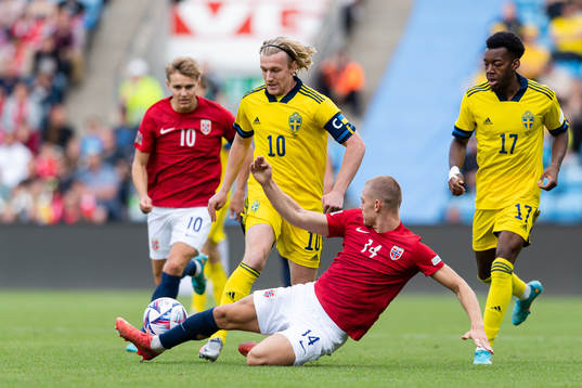 Emil Forsberg and Anthony Elanga of Sweden against Julian