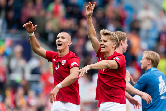 Leo Østigård and Martin Ødegaard of Norway celebrate