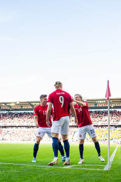 Erling Braut Haaland of Norway celebrates with teammates