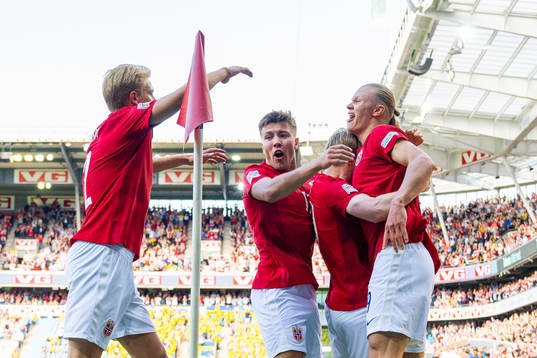 Erling Braut Haaland of Norway celebrates with teammates