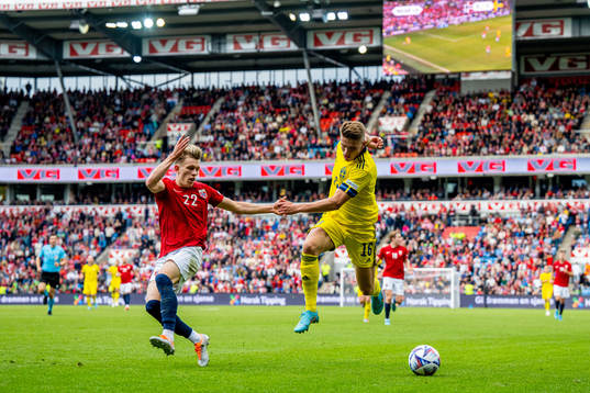 Marcus Holmgren Pedersen of Norway and Viktor Gyökeres of