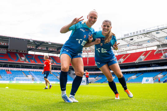 Maria Thorisdottir and Maren Mjelde of the Norwegian
