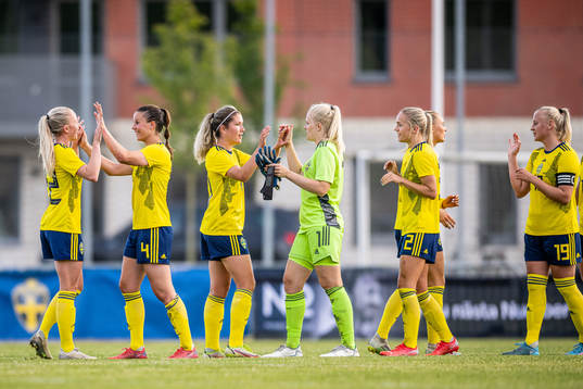 Players of Sweden celebrate