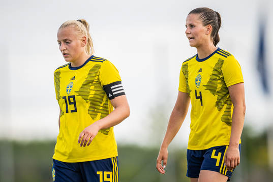 Wilma Carlsson and Josefin Harrysson of Sweden look dejected