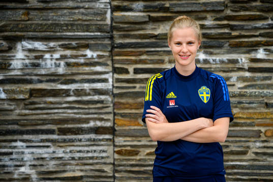 Anna Moilanen, photographer, poses for a portrait