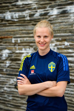 Anna Moilanen, photographer, poses for a portrait