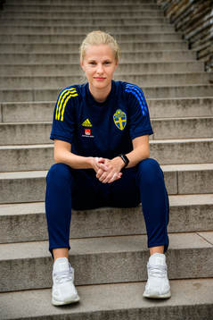 Anna Moilanen, photographer, poses for a portrait
