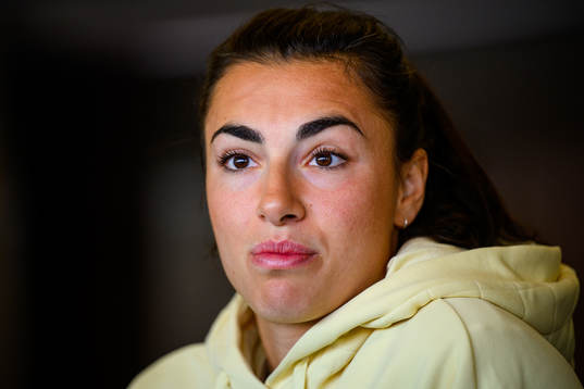 Goalkeeper Zecira Musovic is interviewed by the media