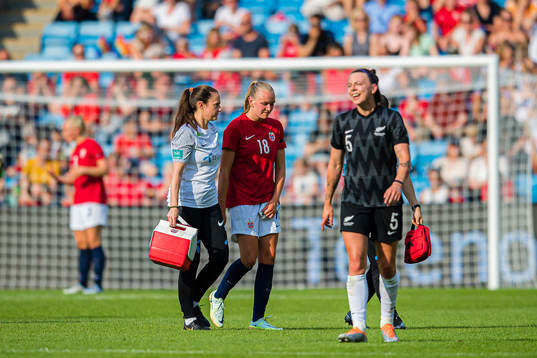 Frida Leonhardsen Maanum of Norway leaves the pitch with an