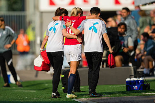 Lisa Fjeldstad Naalsund of Norway leaves the pitch with an