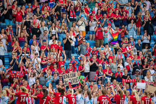 Spectators in the stands celebrates