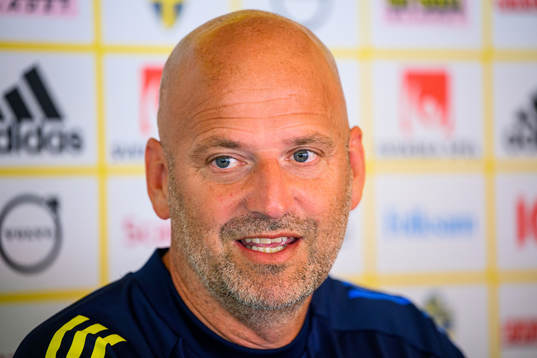 Magnus Wikman, assistant coach is interviewed by the media