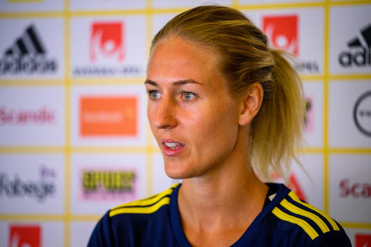 Emma Kullberg is interviewed by the media