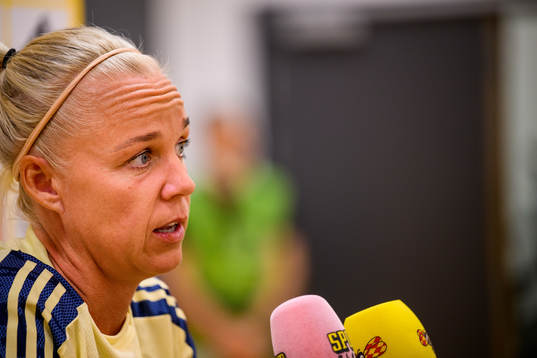 Caroline Seger is interviewed by the media