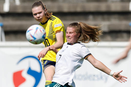 Swedens Bea Sprung in action against Germanys Sarah