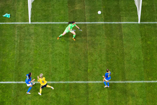 Lina Hurtig of Sweden scores 2-1 behind goalkeeper  Lorena