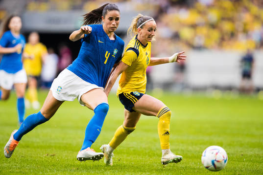 Rafaelle of Brazil and Kosovare Asllani of Sweden