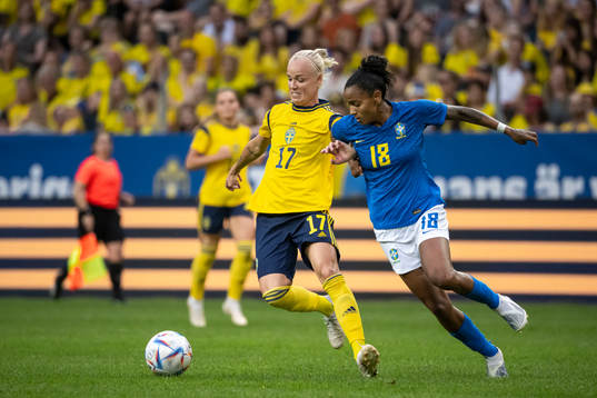 Caroline Seger of Sweden and Geyse of Brazil