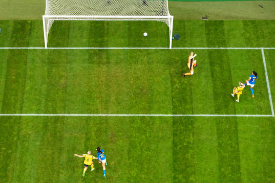 Debinha of Brazil shoots 0-1 behind goalkeeper Hedvig